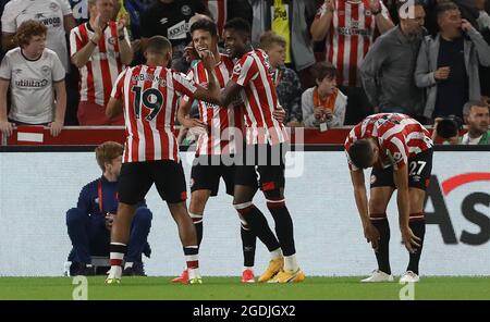 London, UK, 13th August 2021. Christian Norgaard of Brentford ( 2nd L) celebrates after scoring to make it 2-0 during the Premier League match at Brentford Community Stadium, London. Picture credit should read: Paul Terry / Sportimage Credit: Sportimage/Alamy Live News Stock Photo