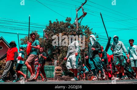 BATAAN, PHILIPPINES - Apr 07, 2017: A group of people on the street during the holy week in the Philippines Stock Photo