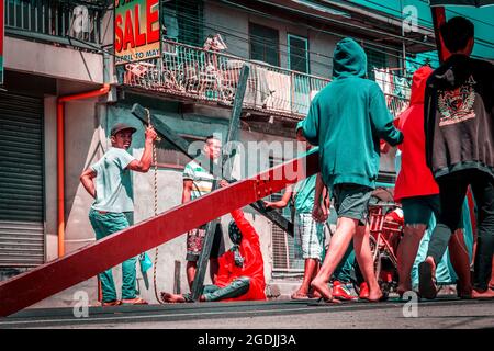 BATAAN, PHILIPPINES - Apr 07, 2017: A group of people on the street during the holy week in the Philippines Stock Photo