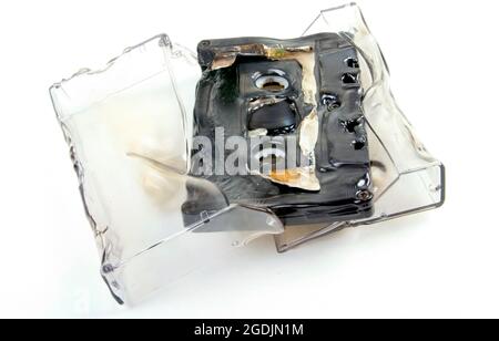 melted cassette with cover Stock Photo