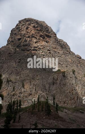 Roque de Argando is a well known phonolite volcanic plug at the center of La Gomera in the Canary Islands. Stock Photo