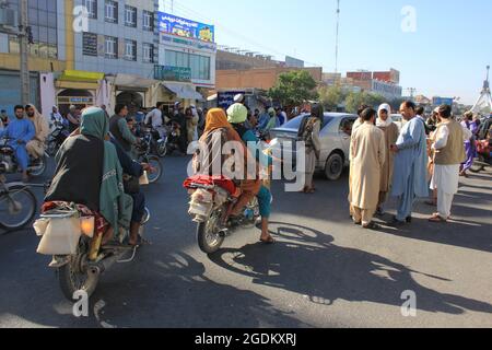 Herat, Afghanistan. 14th Aug, 2021. Taliban militants are seen in Herat province, Afghanistan, Aug. 13, 2021. The Afghan Taliban said their members overran three more provincial capitals on Friday, after they have taken control over a dozen cities within a week. Zabihullah Mujahid, a Taliban spokesman, wrote on his social media account that they captured Tirin Kot, capital of southern Uruzgan province, and Firoz Koah, capital of western Ghor province. Credit: Xinhua/Alamy Live News Stock Photo