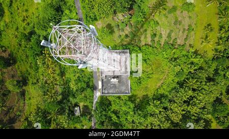 Aerial drone view of tower antennas Telecommunication cell phone, radio transmitters of cellular 5g 4g mobile and smartphones Stock Photo