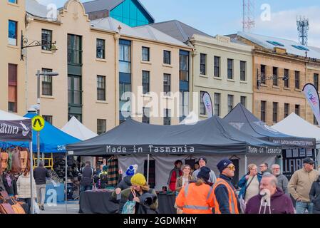 Weekend shoppers and tourists enjoying the Salamanca Markets in Hobart, Tasmania, Australia in May 2021 before the Delta Variant of Covid-19 surfaced Stock Photo