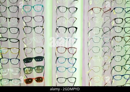 Glasses for sight on shop window. Modern frames Stock Photo