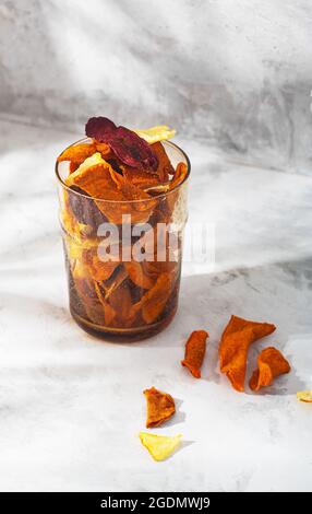 Vegetable organic chips in a glass of potatoes, carrots and beets Stock Photo