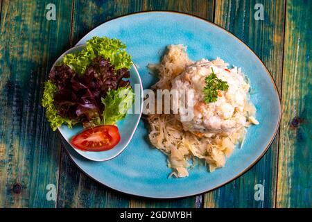 austrian bread dumpling on sauerkraut Stock Photo
