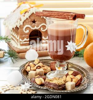 Christmas irish coffee and sweet biscuits on the table. Festive dessert Stock Photo