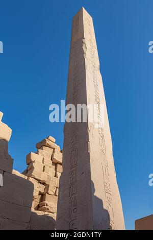 Granite obelisks in Karnak temple. Luxor, Egypt. Commonly known as Karnak, comprises a vast mix of decayed temples, chapels, pylons, and other buildin Stock Photo