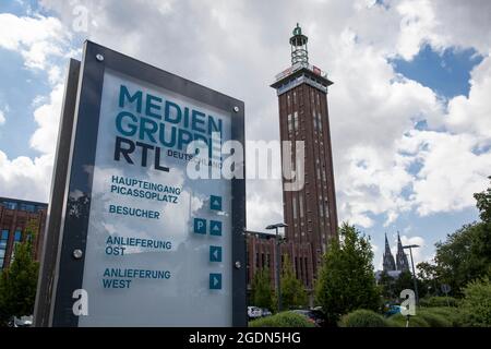 headquarters of the Media Group RTL Germany at Picassoplatz in Deutz, the old tower of the former exhibition center and the historic Rhein Halls, Colo Stock Photo