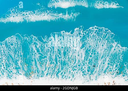 Resin art texture with ocean waves. Sea background made of epoxy art Stock Photo