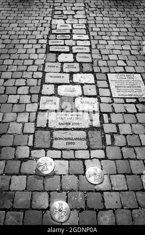 AACHEN, GERMANY. OCTOBER 04, 2020. Nomadic Memory Names and stones Sidewalk Stock Photo