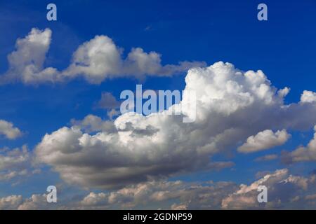Blue sky in contrast with white clouds Stock Photo