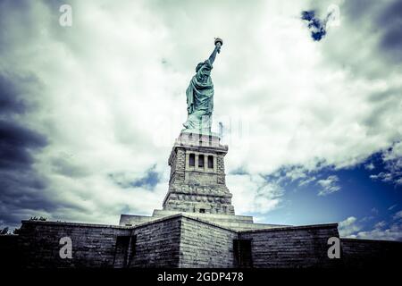 Walking around the Statue of liberty Stock Photo