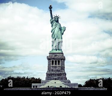 Walking around the Statue of liberty Stock Photo