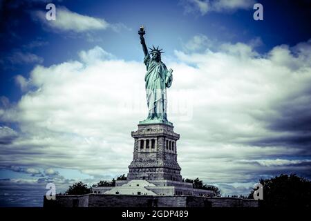 Walking around the Statue of liberty Stock Photo