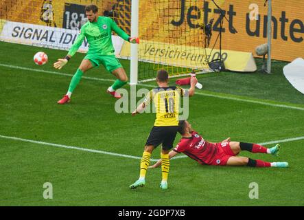 Thorgan HAZARD, BVB 10    scores, shoots goal , Tor, Treffer,, 2-1, Kevin TRAPP, FRA 1, Filip KOSTIC, FRA 10  in the match BORUSSIA DORTMUND - EINTRACHT FRANKFURT 1.German Football League on August 14, 2021 in Dortmund, Germany  Season 2020/2021, matchday 1, 1.Bundesliga, 1.Spieltag, BVB,  © Peter Schatz / Alamy Live News    - DFL REGULATIONS PROHIBIT ANY USE OF PHOTOGRAPHS as IMAGE SEQUENCES and/or QUASI-VIDEO - Stock Photo