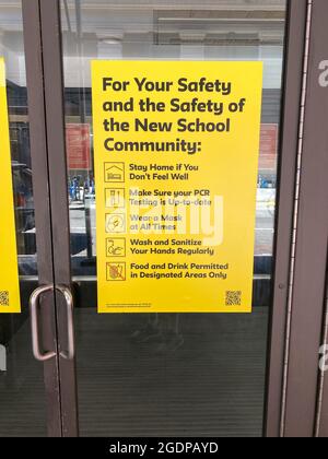 New York, NY, USA - Aug 14, 2021: The New School entrance on E 16th Street warning students about safety concerns during the pandemic Stock Photo
