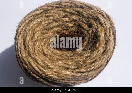 Thick jute rope coiled in the shape of a circle. Sailing