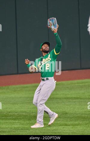 Oakland Athletics center fielder Starling Marte, left, and shortstop Elvis  Andrus, collide going after a fly ball hit by Chicago White Sox's Jose  Abreu in the ninth inning of a baseball game