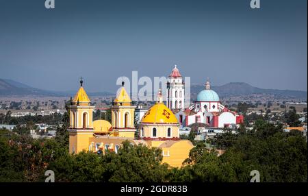 Church domes form the skyline of Ciudad Cerdan in Puebla, Mexico. Stock Photo