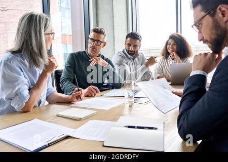 International business executive team having discussion at boardroom meeting. Stock Photo