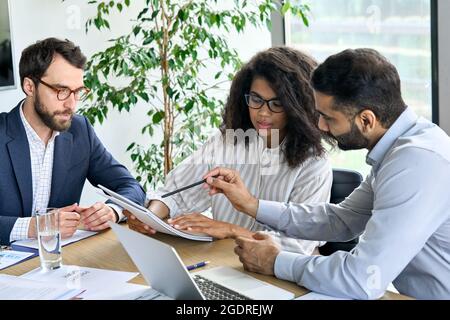 Diverse business executive team discussion financial report at boardroom. Stock Photo