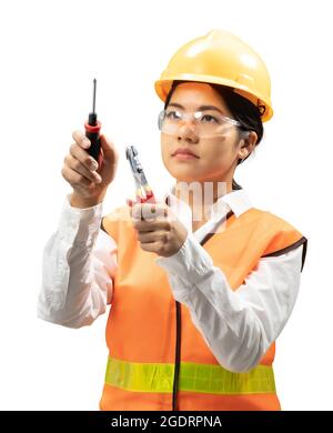 Asian engineer or technician wear safety helmet and reflective vest with tools Stock Photo