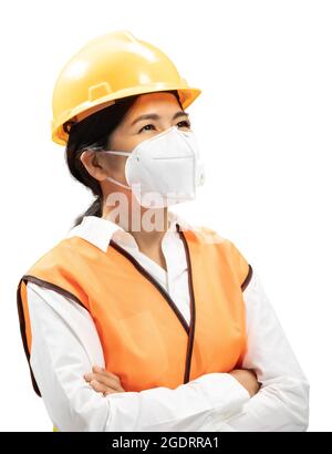 Asian engineer or technician wear safety helmet and face mask Stock Photo