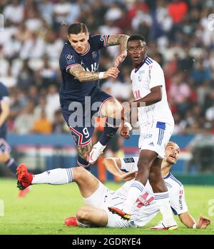 Paris, France. 14th Aug, 2021. Mauro Icardi (top L) of Paris Saint-Germain competes during the French Ligue 1 football match against Strasbourg in Paris, France, Aug. 14, 2021. Credit: Gao Jing/Xinhua/Alamy Live News Stock Photo