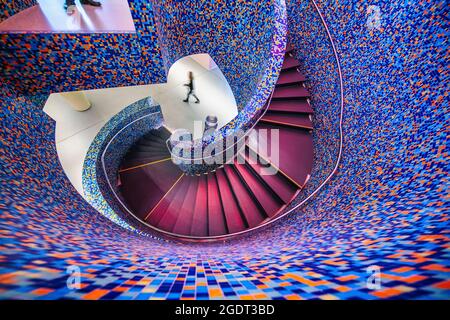 The Netherlands, Groningen, Groninger Museum, Architect Alessandro Mendini. Staircase in central hall. Stock Photo