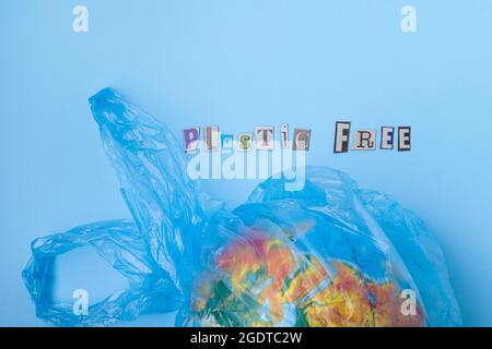 Plastic free words cut out of magazines. Flat lay, on a blue background. top view. High quality photo Stock Photo