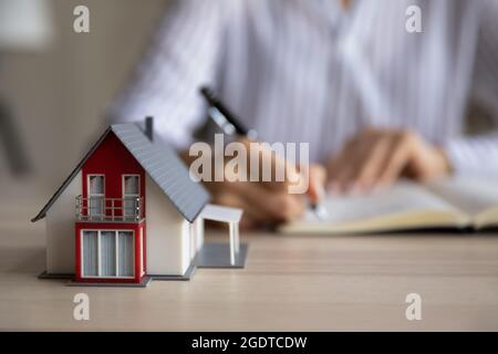 Close up of mock-up house model on table Stock Photo