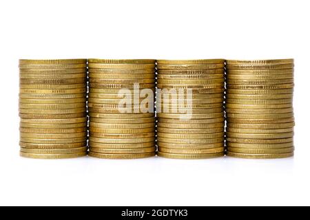 old & used golden coins stack up in white background Stock Photo