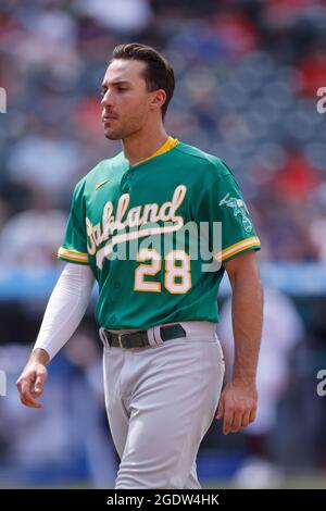 CLEVELAND, OH - AUGUST 12: Matt Chapman (26) of the Oakland A's throws a  runner out after fielding the ball at third base during a game against the  Cl Stock Photo - Alamy