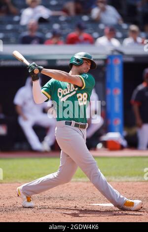 CLEVELAND, OH - AUGUST 12: Matt Chapman (26) of the Oakland A's throws a  runner out after fielding the ball at third base during a game against the  Cl Stock Photo - Alamy