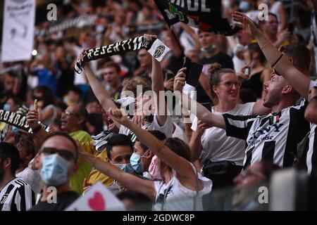 Torino, Italy. 14th Aug, 2021. Juventus fans cheer on during the pre season friendly football match between Juventus FC and Atalanta BC at Allianz stadium in Turin (Italy), August 14th, 2021. Photo Federico Tardito/Insidefoto Credit: insidefoto srl/Alamy Live News Stock Photo