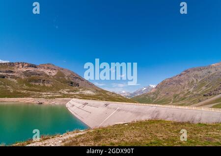 Dam and a reservoir at 2450 m in the French Alps, Réserve de la Grande Sassière, Réserve de la Grande Sassière,Parc National de la Vanoise Stock Photo