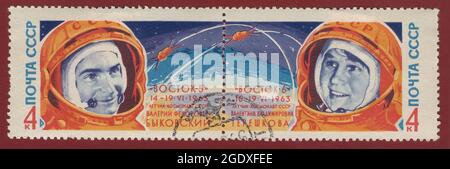 USSR- CIRCA 1963: USSR stamps dedicated to astronaut V.F.Bykovsky and the first woman astronaut V.V.Tereshkova, circa 1963. Stock Photo