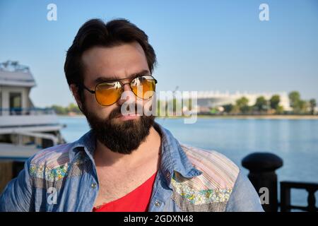 Outdoor portrait of young adult caucasian man Stock Photo