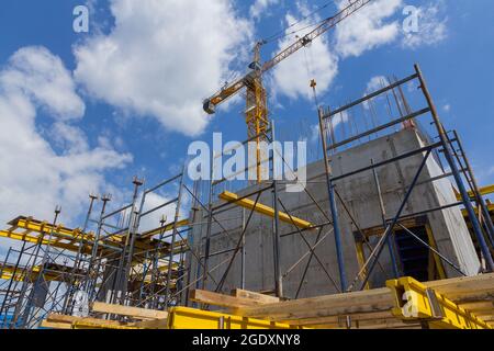 Formwork for monolithic construction. Building construction on monolithic technology. Construction of monolithic walls at a construction site. Stock Photo