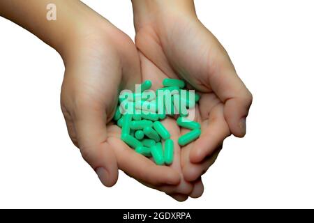 Close up supplement food in hand. Health care concept isolated white background with clipping path Stock Photo
