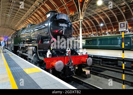 The West Somerset Steam Express 14/8/2021. Pulled by locomotive 45596 Bahamas.in Paddington Station London UK Stock Photo