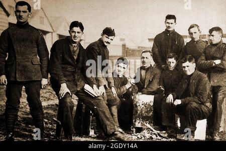 WWI Recruits of the British Royal Flying Corps Mechanics at Farnborough in their distinctive khaki wrap-over tunics. The Royal Naval Air Service  or RNAS was the air arm of the Royal Navy. under the direction of the Admiralty's Air Department, and existed formally in April 1918,  it merged with the British Army's Royal Flying Corps and became  the world's first independent air force, the Royal Air Force, Stock Photo