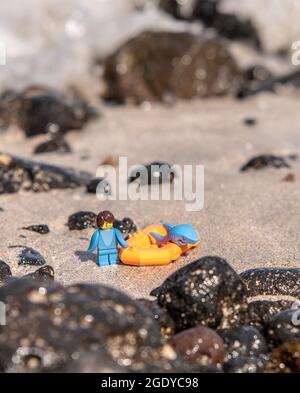 LEGO shark minifigure on the beach Stock Photo