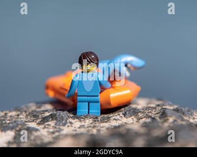 LEGO shark minifigure on the beach Stock Photo