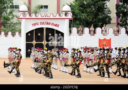 Bangalore, India. 15th Aug, 2021. Indian Police and Border Security Force (BSF) personnel march during India's Independence Day celebrations at the Manek Shaw Parade Grounds, in Bangalore, India, Aug. 15, 2021. Credit: Str/Xinhua/Alamy Live News Stock Photo