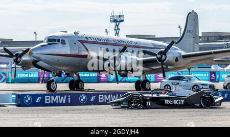 Berlin, Germany. 15th Aug, 2021. Motorsport: Formula E World Championship, ePrix 2021, race at the former Tempelhof Airport. Norman Nato of the ROKiT Venturi Racing team drives past an aircraft. Credit: Andreas Gora/dpa/Alamy Live News Stock Photo