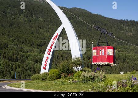 Briancon, France - July 8, 2020: Serre Chevalier is a major alpine ski resort in Southeastern France. Imitation of a Cabin gondola at a roundabout out Stock Photo