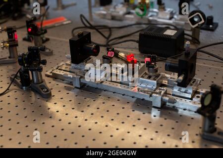 Laser filtering experiment in a laser lab Stock Photo